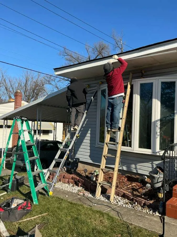 Restoration crew performing exterior repair in Channelview